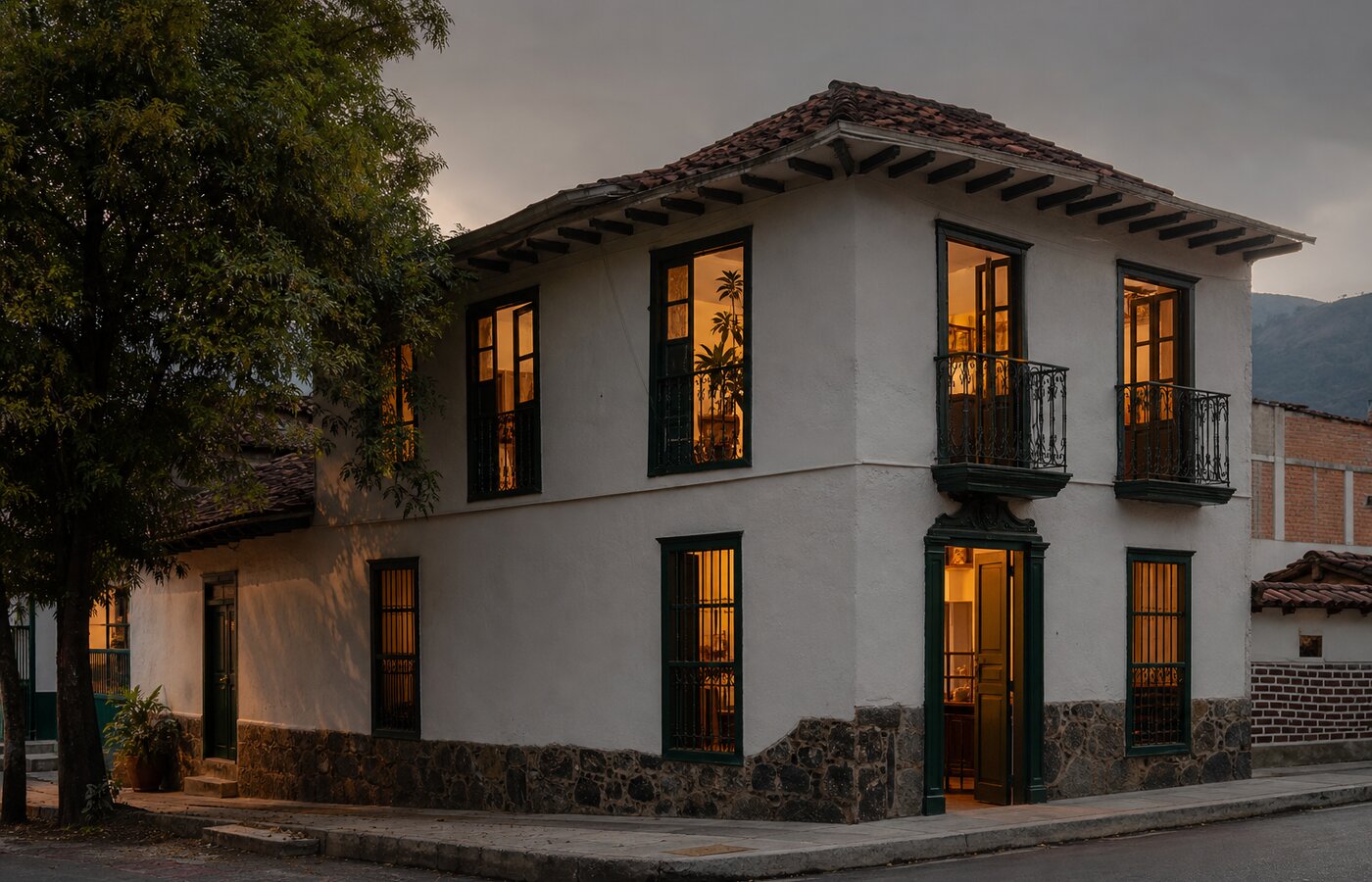 Casa cultural en Manrique Medellín al atardecer, evocando la tradición tanguera